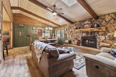 Charming single-level cabin in Pinetop Country Club, offering 1 on Pinetop Lakes Country Club in Arizona - for sale on GolfHomes.com, golf home, golf lot