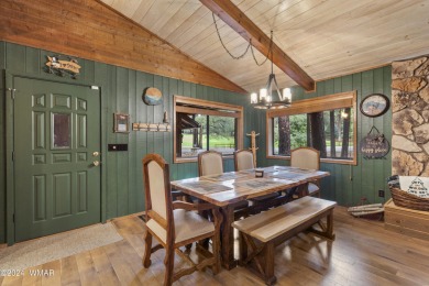 Charming single-level cabin in Pinetop Country Club, offering 1 on Pinetop Lakes Country Club in Arizona - for sale on GolfHomes.com, golf home, golf lot