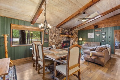 Charming single-level cabin in Pinetop Country Club, offering 1 on Pinetop Lakes Country Club in Arizona - for sale on GolfHomes.com, golf home, golf lot