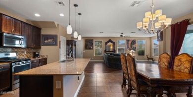 Step inside this beautifully updated 4-bedroom, 3.5-bathroom on Verrado Golf Club  in Arizona - for sale on GolfHomes.com, golf home, golf lot