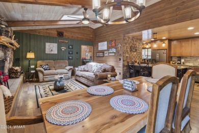 Charming single-level cabin in Pinetop Country Club, offering 1 on Pinetop Lakes Country Club in Arizona - for sale on GolfHomes.com, golf home, golf lot