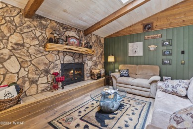 Charming single-level cabin in Pinetop Country Club, offering 1 on Pinetop Lakes Country Club in Arizona - for sale on GolfHomes.com, golf home, golf lot