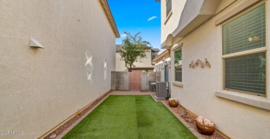 Step inside this beautifully updated 4-bedroom, 3.5-bathroom on Verrado Golf Club  in Arizona - for sale on GolfHomes.com, golf home, golf lot