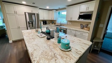 This home has been completely renovated on the inside!! From the on Water Oak Country Club Estates in Florida - for sale on GolfHomes.com, golf home, golf lot