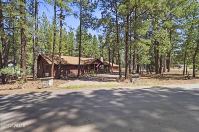 Charming single-level cabin in Pinetop Country Club, offering 1 on Pinetop Lakes Country Club in Arizona - for sale on GolfHomes.com, golf home, golf lot