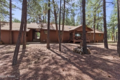 Charming single-level cabin in Pinetop Country Club, offering 1 on Pinetop Lakes Country Club in Arizona - for sale on GolfHomes.com, golf home, golf lot