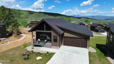 Absolutely stunning ski-in ski-out show home in Granby Ranch on Headwaters Golf Course At Granby Ranch in Colorado - for sale on GolfHomes.com, golf home, golf lot