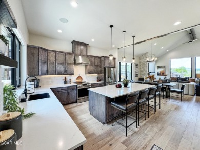 Absolutely stunning ski-in ski-out show home in Granby Ranch on Headwaters Golf Course At Granby Ranch in Colorado - for sale on GolfHomes.com, golf home, golf lot