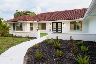 TURNKEY3-bed/3-bath CBS block home on a rare 1-acre lot with on Evergreen Club in Florida - for sale on GolfHomes.com, golf home, golf lot