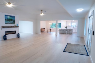 TURNKEY3-bed/3-bath CBS block home on a rare 1-acre lot with on Evergreen Club in Florida - for sale on GolfHomes.com, golf home, golf lot