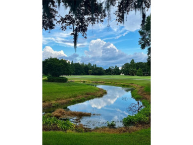 ***JUST REDUCED AND NOW OFFERING $3500.00 TOWARDS CLOSING COSTS on Heritage Isles Golf and Country Club in Florida - for sale on GolfHomes.com, golf home, golf lot