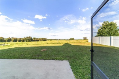 Located on a Premium corner lot overlooking farmland with no on Baseline Golf Course in Florida - for sale on GolfHomes.com, golf home, golf lot