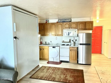 Looking for a great investment or lock and leave vacation on Headwaters Golf Course At Granby Ranch in Colorado - for sale on GolfHomes.com, golf home, golf lot
