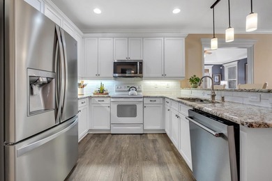 Sitting gracefully on a hilltop corner lot across from the on Southwood Golf Club in Florida - for sale on GolfHomes.com, golf home, golf lot