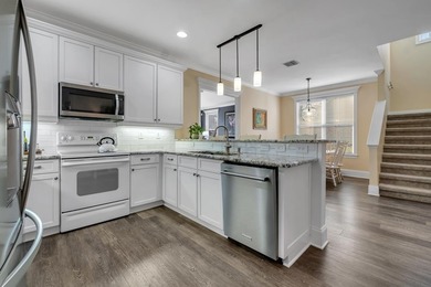 Sitting gracefully on a hilltop corner lot across from the on Southwood Golf Club in Florida - for sale on GolfHomes.com, golf home, golf lot