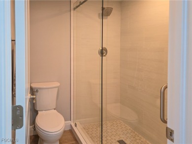 Discover the newest first-floor renovation in the sought-after on Hideaway Country Club in Florida - for sale on GolfHomes.com, golf home, golf lot