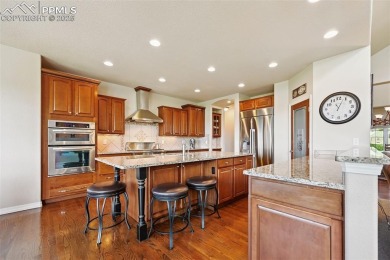 Beautifully situated on a spacious lot with sweeping Front Range on Kings Deer Golf Club in Colorado - for sale on GolfHomes.com, golf home, golf lot
