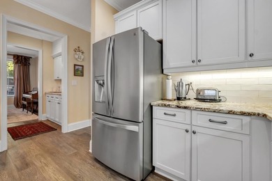 Sitting gracefully on a hilltop corner lot across from the on Southwood Golf Club in Florida - for sale on GolfHomes.com, golf home, golf lot