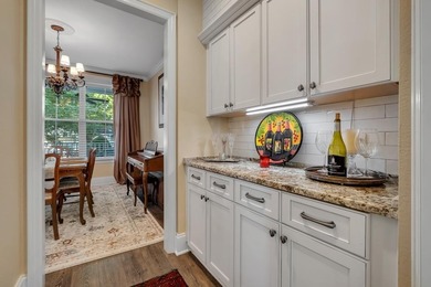 Sitting gracefully on a hilltop corner lot across from the on Southwood Golf Club in Florida - for sale on GolfHomes.com, golf home, golf lot