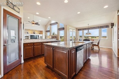 Beautifully situated on a spacious lot with sweeping Front Range on Kings Deer Golf Club in Colorado - for sale on GolfHomes.com, golf home, golf lot
