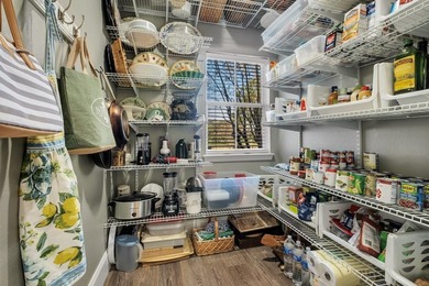 Sitting gracefully on a hilltop corner lot across from the on Southwood Golf Club in Florida - for sale on GolfHomes.com, golf home, golf lot