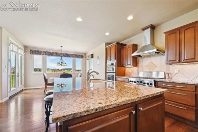 Beautifully situated on a spacious lot with sweeping Front Range on Kings Deer Golf Club in Colorado - for sale on GolfHomes.com, golf home, golf lot
