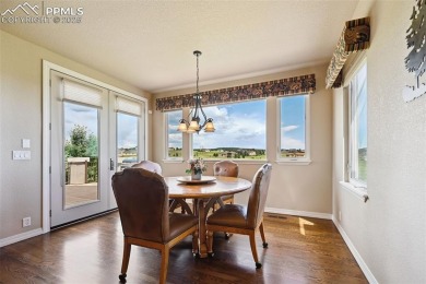 Beautifully situated on a spacious lot with sweeping Front Range on Kings Deer Golf Club in Colorado - for sale on GolfHomes.com, golf home, golf lot