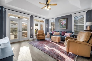 Sitting gracefully on a hilltop corner lot across from the on Southwood Golf Club in Florida - for sale on GolfHomes.com, golf home, golf lot