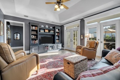 Sitting gracefully on a hilltop corner lot across from the on Southwood Golf Club in Florida - for sale on GolfHomes.com, golf home, golf lot