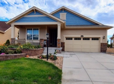 Welcome to 14737 Ulster Loop, a beautifully maintained home in on Heritage Todd Creek Golf Club in Colorado - for sale on GolfHomes.com, golf home, golf lot