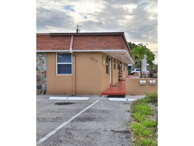 Beautiful Income property. Minutes away from Lake Worth Golf on Lake Worth Municipal Golf Course in Florida - for sale on GolfHomes.com, golf home, golf lot