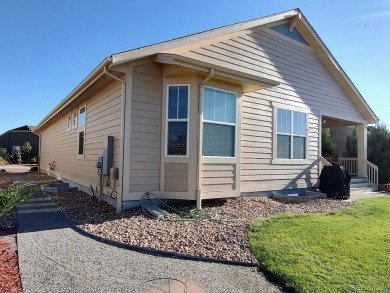 Welcome to 14737 Ulster Loop, a beautifully maintained home in on Heritage Todd Creek Golf Club in Colorado - for sale on GolfHomes.com, golf home, golf lot