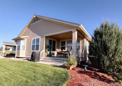 Welcome to 14737 Ulster Loop, a beautifully maintained home in on Heritage Todd Creek Golf Club in Colorado - for sale on GolfHomes.com, golf home, golf lot