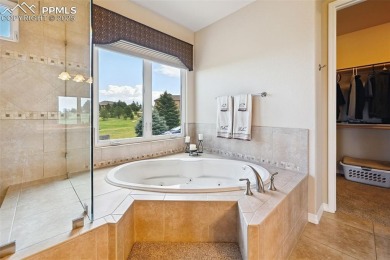 Beautifully situated on a spacious lot with sweeping Front Range on Kings Deer Golf Club in Colorado - for sale on GolfHomes.com, golf home, golf lot