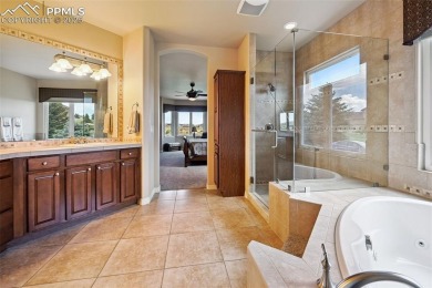 Beautifully situated on a spacious lot with sweeping Front Range on Kings Deer Golf Club in Colorado - for sale on GolfHomes.com, golf home, golf lot