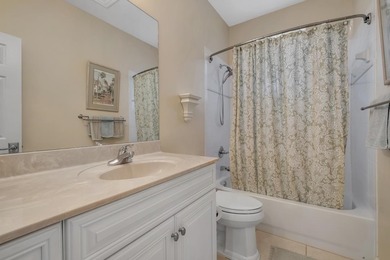 Sitting gracefully on a hilltop corner lot across from the on Southwood Golf Club in Florida - for sale on GolfHomes.com, golf home, golf lot