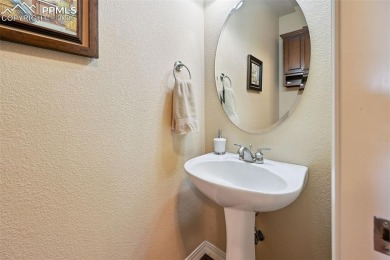 Beautifully situated on a spacious lot with sweeping Front Range on Kings Deer Golf Club in Colorado - for sale on GolfHomes.com, golf home, golf lot