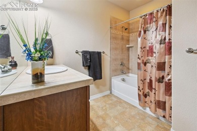 Beautifully situated on a spacious lot with sweeping Front Range on Kings Deer Golf Club in Colorado - for sale on GolfHomes.com, golf home, golf lot