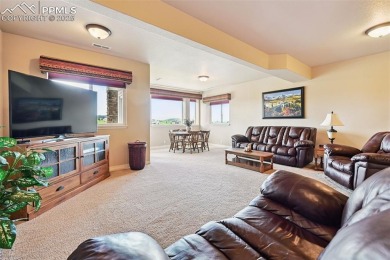 Beautifully situated on a spacious lot with sweeping Front Range on Kings Deer Golf Club in Colorado - for sale on GolfHomes.com, golf home, golf lot