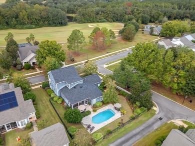 Sitting gracefully on a hilltop corner lot across from the on Southwood Golf Club in Florida - for sale on GolfHomes.com, golf home, golf lot