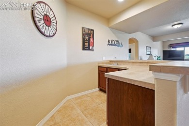 Beautifully situated on a spacious lot with sweeping Front Range on Kings Deer Golf Club in Colorado - for sale on GolfHomes.com, golf home, golf lot