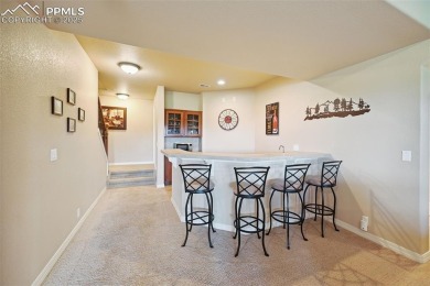 Beautifully situated on a spacious lot with sweeping Front Range on Kings Deer Golf Club in Colorado - for sale on GolfHomes.com, golf home, golf lot