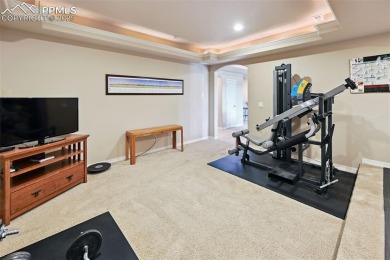 Beautifully situated on a spacious lot with sweeping Front Range on Kings Deer Golf Club in Colorado - for sale on GolfHomes.com, golf home, golf lot