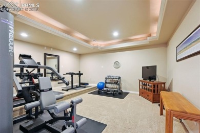 Beautifully situated on a spacious lot with sweeping Front Range on Kings Deer Golf Club in Colorado - for sale on GolfHomes.com, golf home, golf lot
