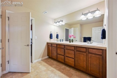 Beautifully situated on a spacious lot with sweeping Front Range on Kings Deer Golf Club in Colorado - for sale on GolfHomes.com, golf home, golf lot