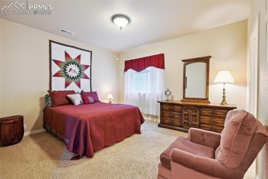 Beautifully situated on a spacious lot with sweeping Front Range on Kings Deer Golf Club in Colorado - for sale on GolfHomes.com, golf home, golf lot
