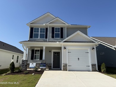 Premium lot! This gorgeous new construction home highlights on Riverwood Golf and Athletic Club in North Carolina - for sale on GolfHomes.com, golf home, golf lot