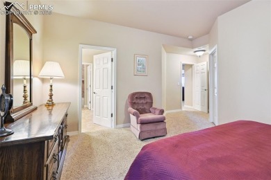 Beautifully situated on a spacious lot with sweeping Front Range on Kings Deer Golf Club in Colorado - for sale on GolfHomes.com, golf home, golf lot