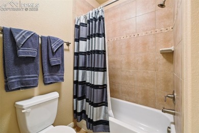 Beautifully situated on a spacious lot with sweeping Front Range on Kings Deer Golf Club in Colorado - for sale on GolfHomes.com, golf home, golf lot