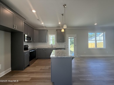 Premium lot! This gorgeous new construction home highlights on Riverwood Golf and Athletic Club in North Carolina - for sale on GolfHomes.com, golf home, golf lot